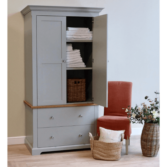 Housekeepers cupboard ideal for storing linen, has two deep soft close drawers and a top cupboard section with internal height adjustable shelves